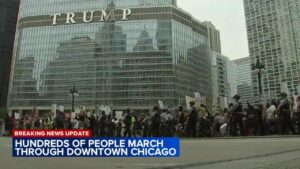 ICE protest draws thousands to Chicago Loop; car plows through early on – CBS News