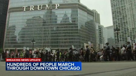 ICE protest draws thousands to Chicago Loop; car plows through early on – CBS News
