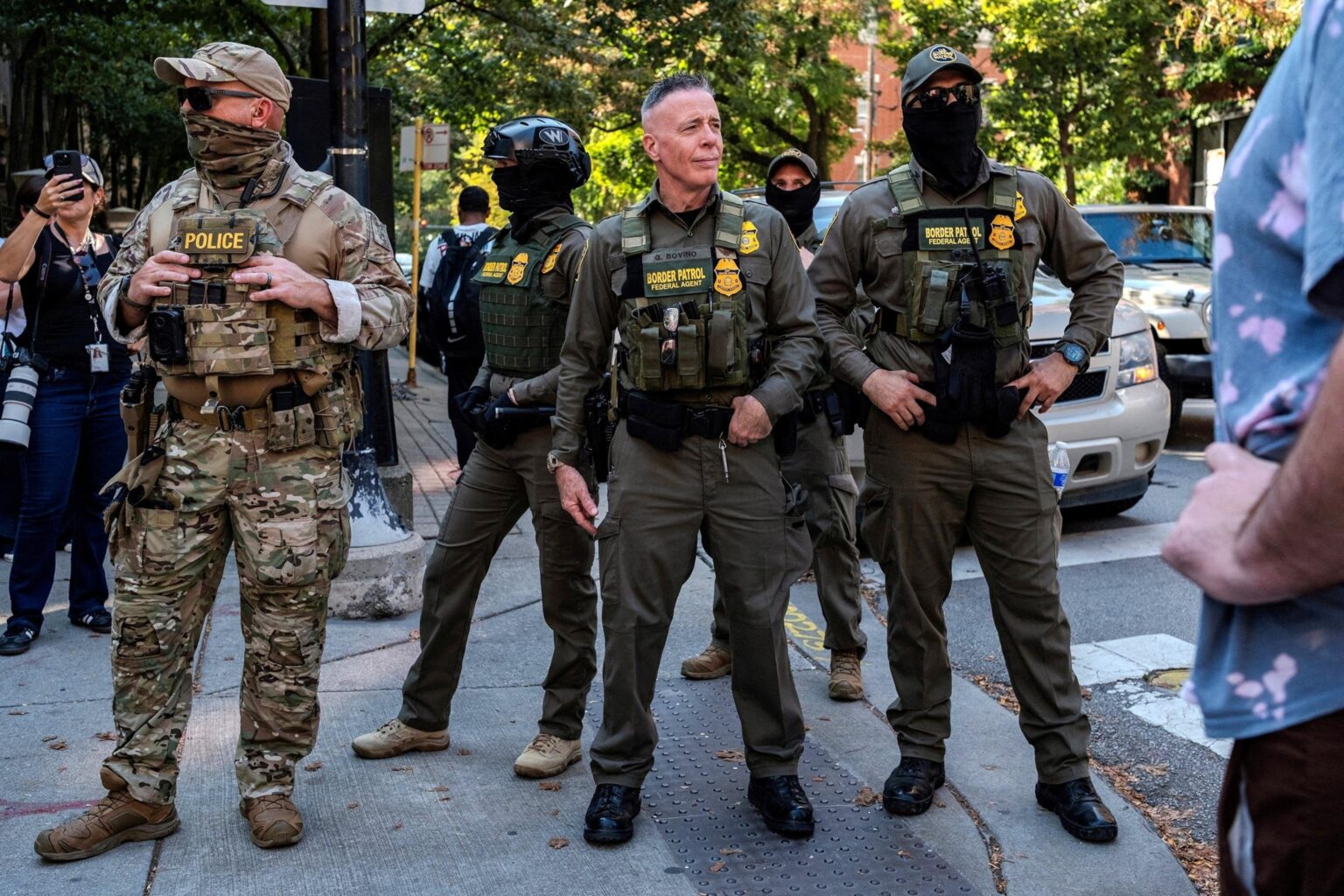 Border Patrol agents shoot armed woman in Chicago as protesters confront immigration personnel – Reuters