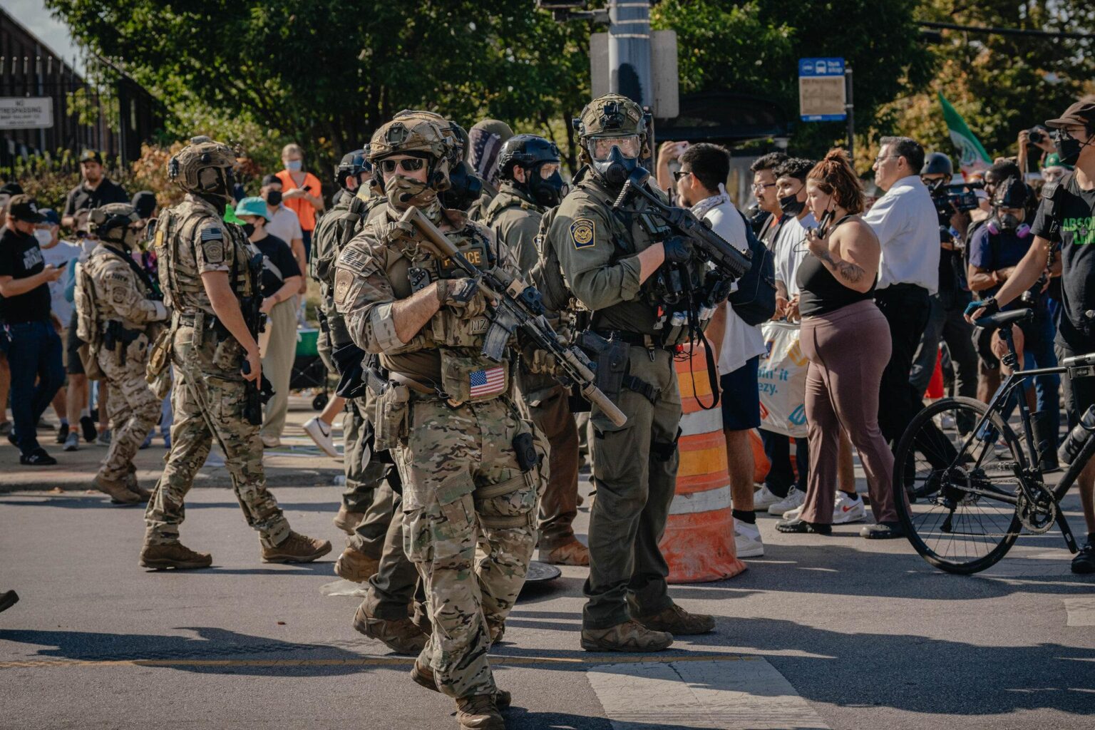 Federal agents shoot woman in Chicago neighborhood after allegedly being rammed, boxed in by cars, DHS says – CBS News
